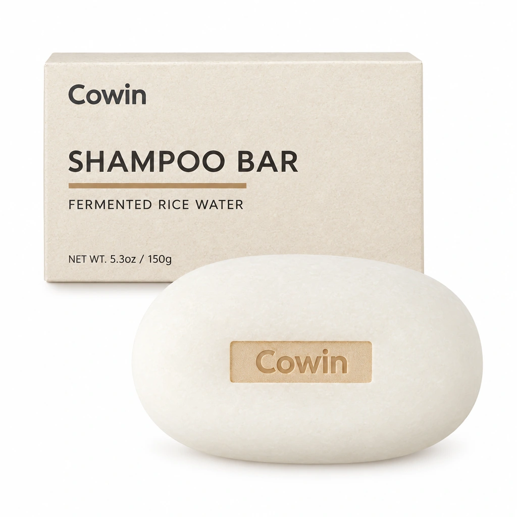 Cowin ivory oval shampoo bar beside a cream carton