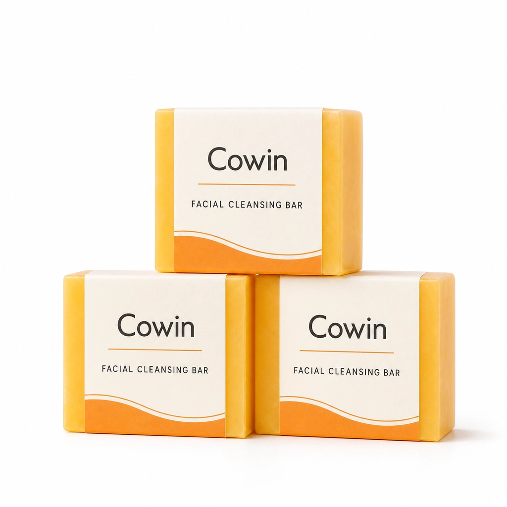 Cowin three golden facial cleansing bars with white sleeves
