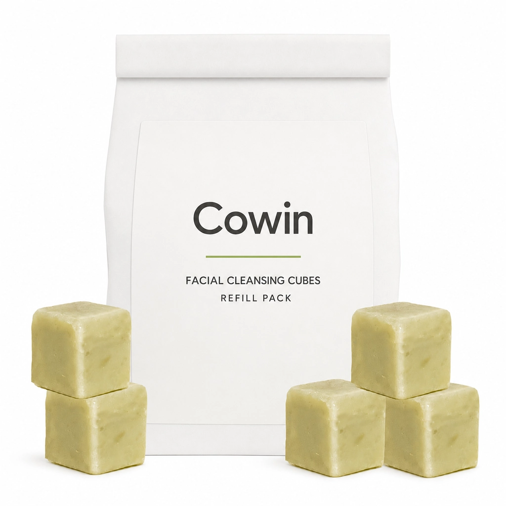 Cowin small green cleansing cubes in front of a white refill pouch