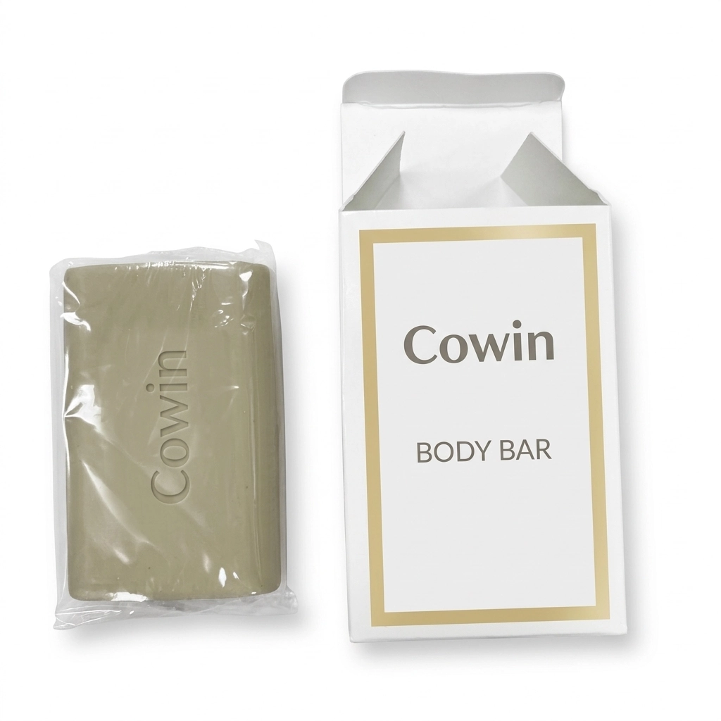 Cowin olive rectangular body bar in a clear wrapper beside a carton